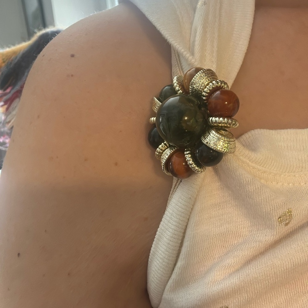 Simple brooch with silver browns and black beads